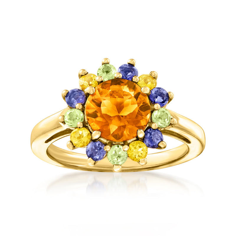 Gold-tone flower ring with orange center gemstone and purple, green, yellow accents