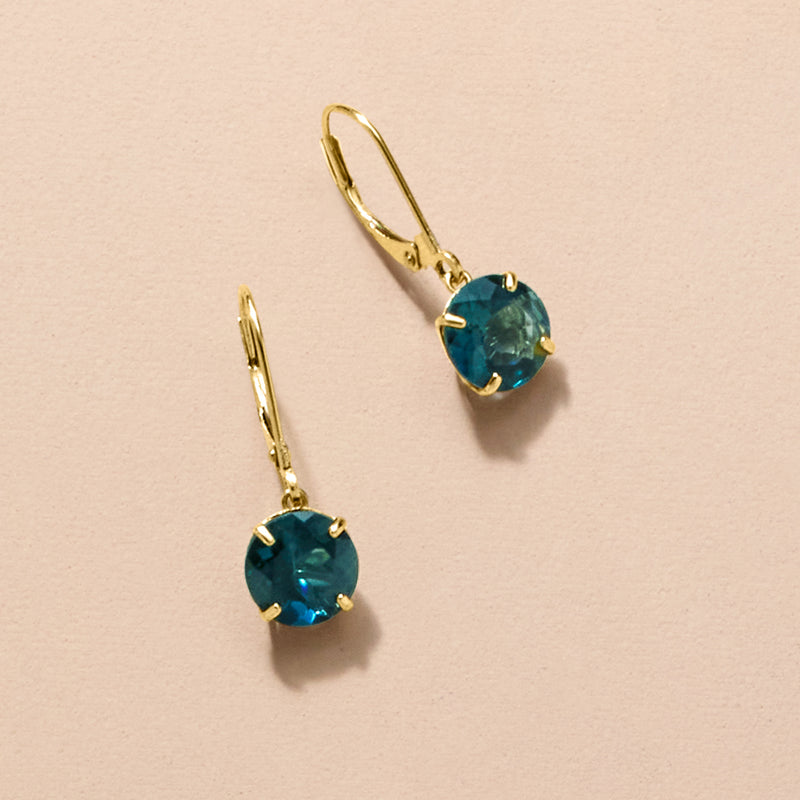 Yellow gold leverback drop earrings with round blue gemstone dangles