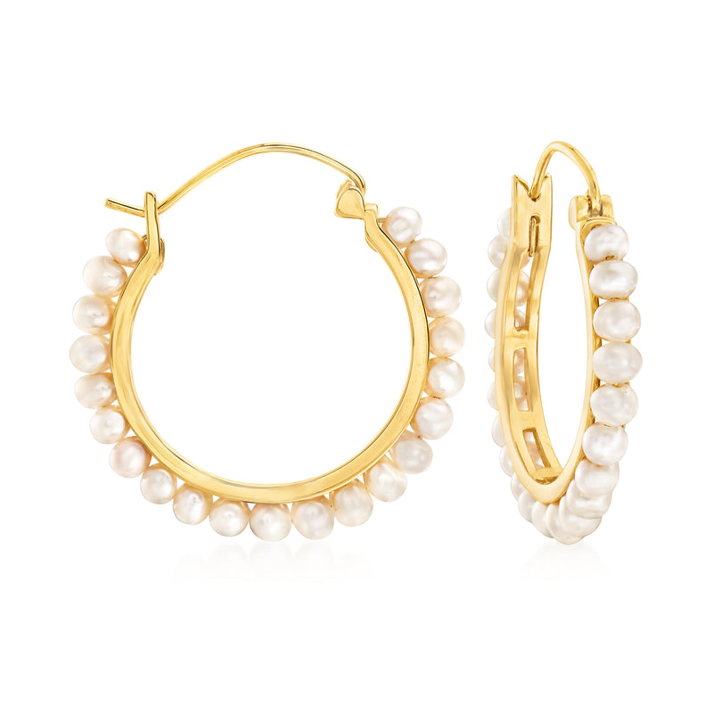 Cultured pearl hoop earrings with gold-tone hoops and small white pearls around the rim