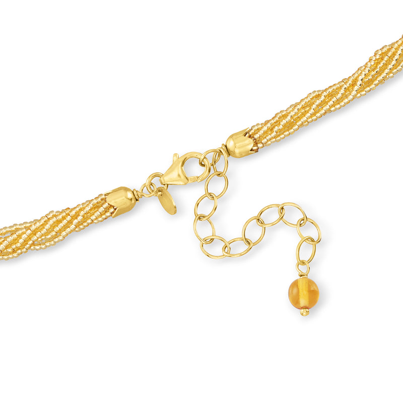 Turquoise starfish necklace clasp and gold-tone chain with glass bead accent