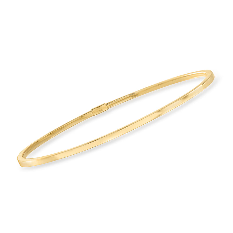 14kt yellow gold bangle bracelet with smooth oval profile and hinge clasp