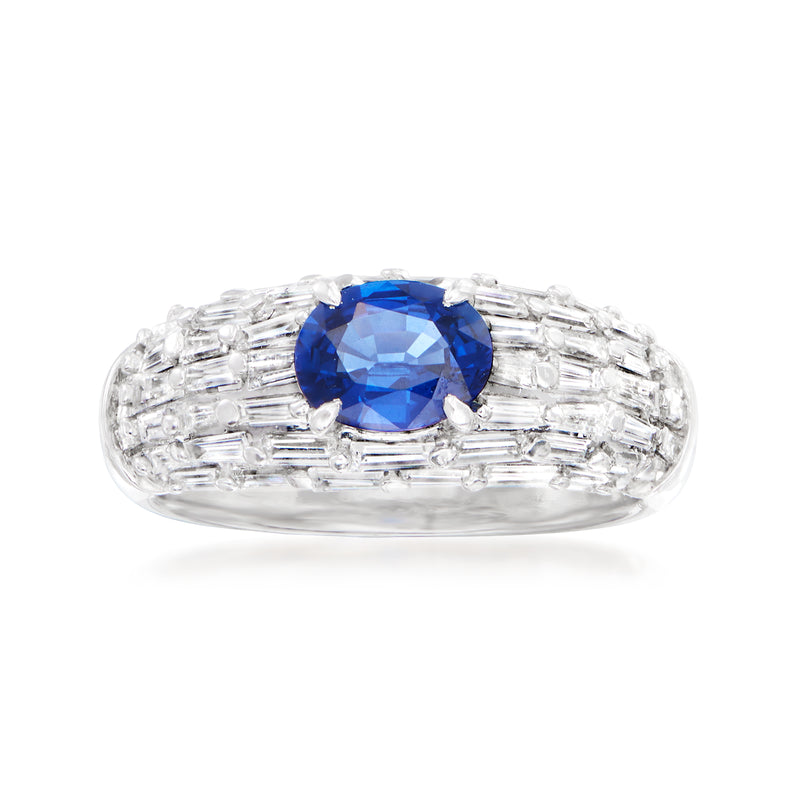 Platinum vintage ring with blue oval sapphire center and baguette diamond band