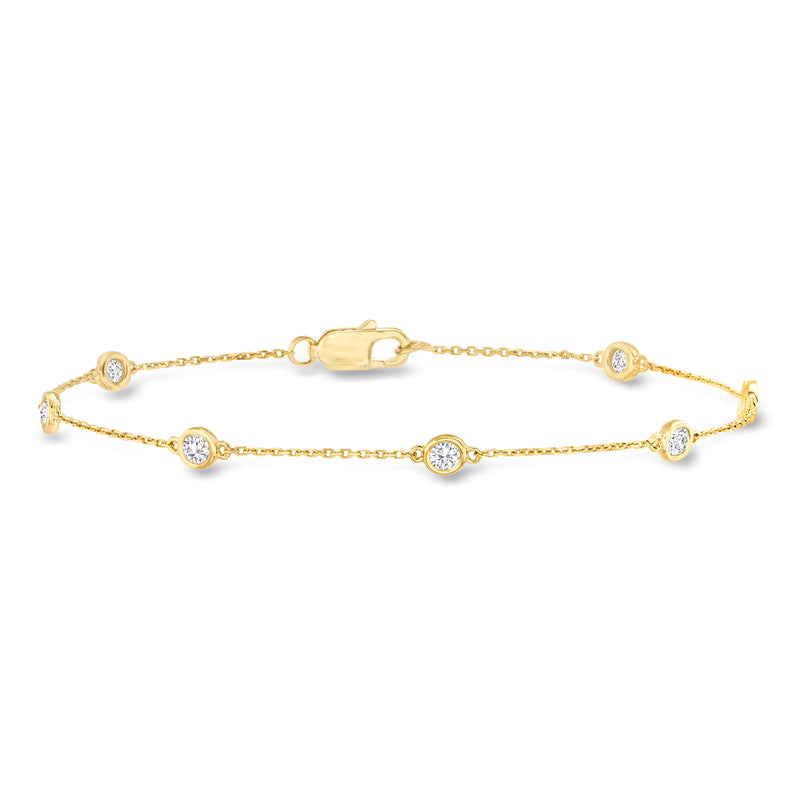 18kt gold over sterling diamond station bracelet with round bezel-set stations