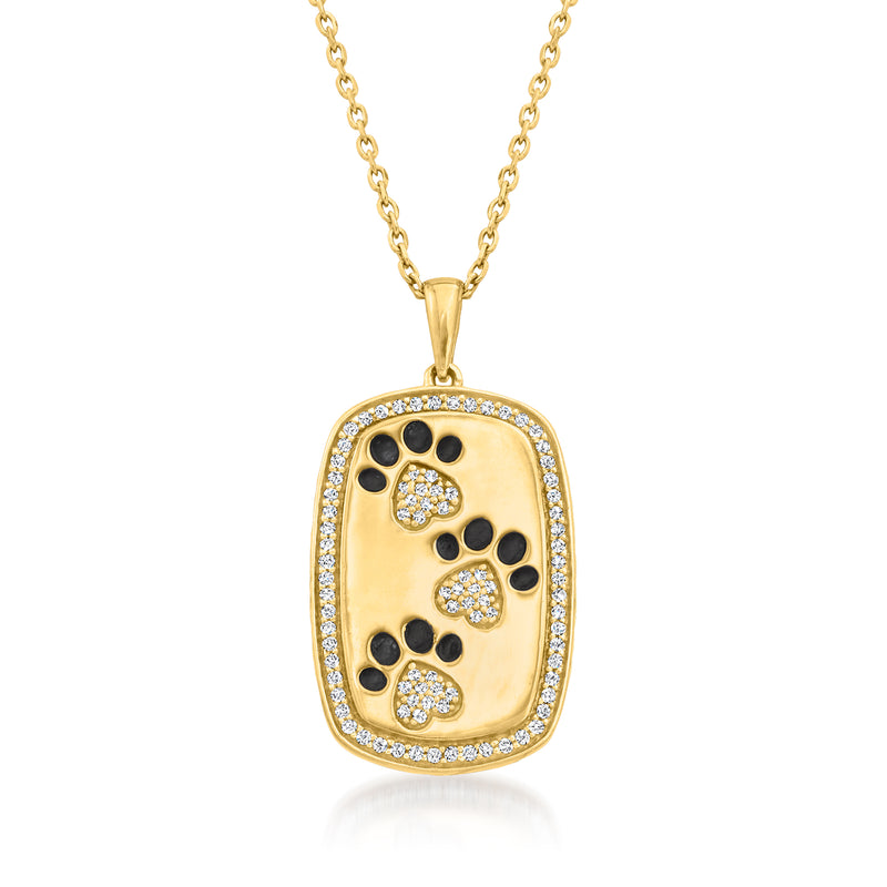 Gold paw print pendant necklace with black enamel, diamond accents, oval bail