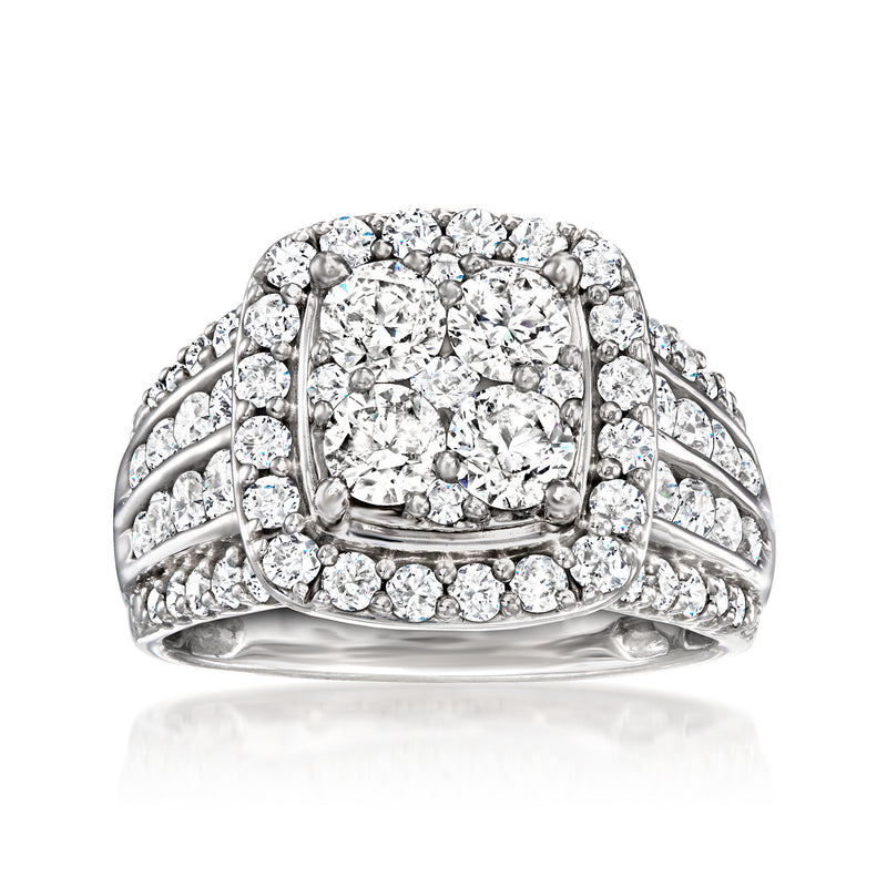 Diamond cluster ring in white gold with halo and split shank