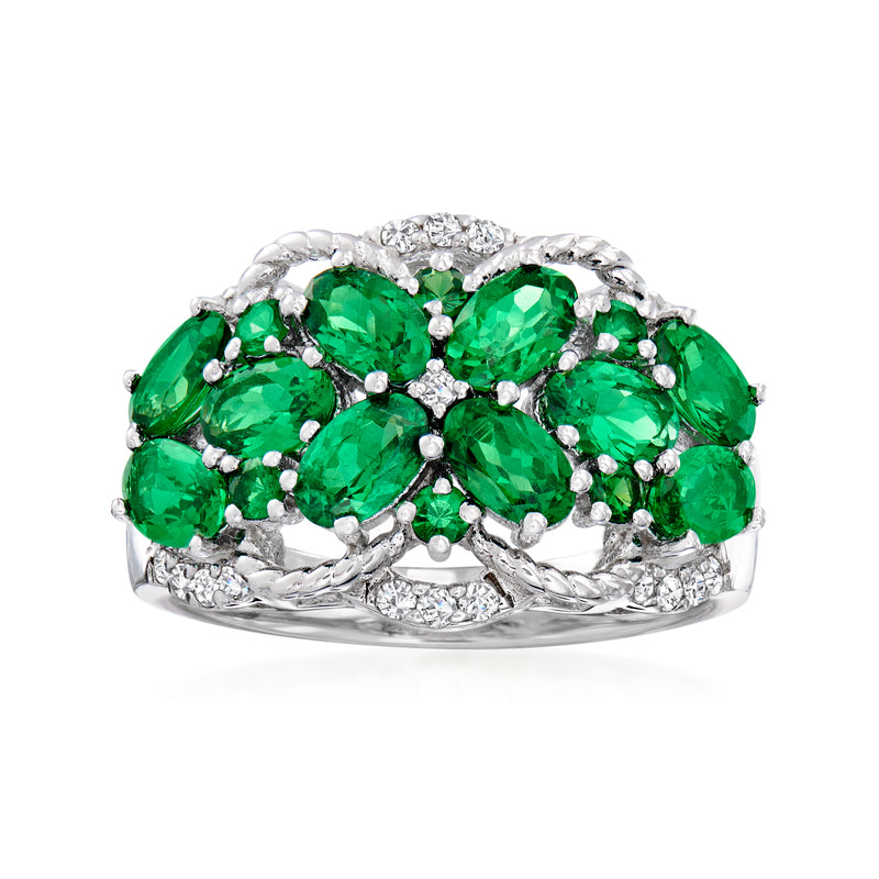Sterling silver ring with oval green tsavorite stones and small round diamond accents