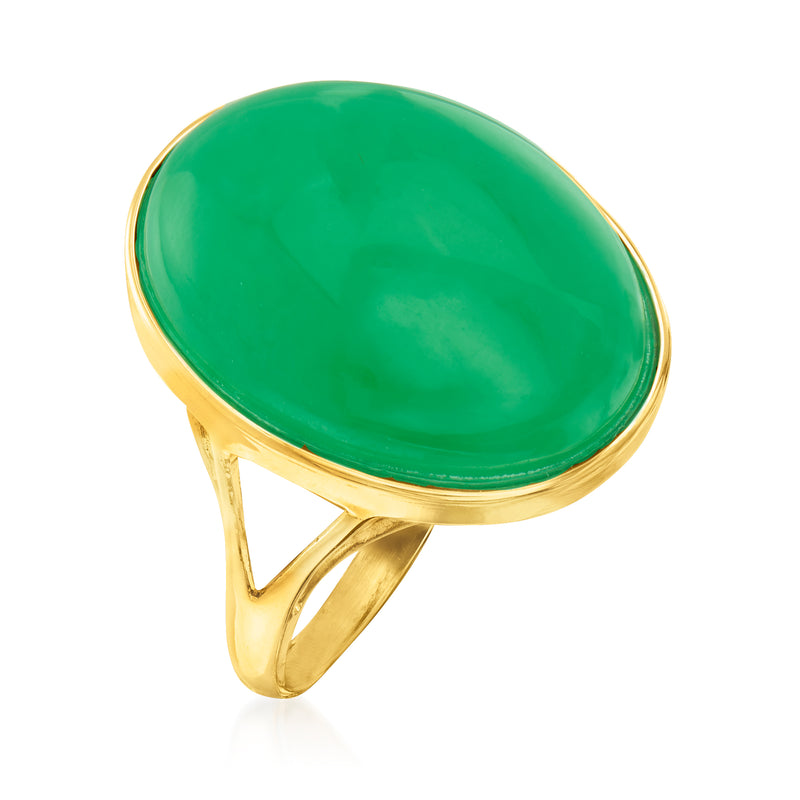 Oval jade-green cabochon ring in 14k yellow gold, angled view