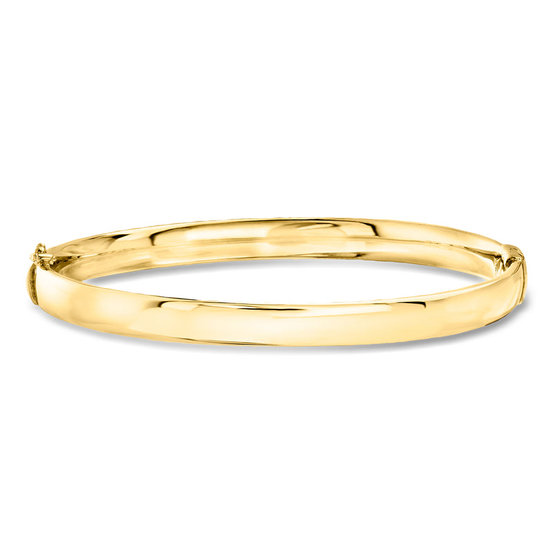 Oval gold-tone bangle bracelet with small clasp detail on the side