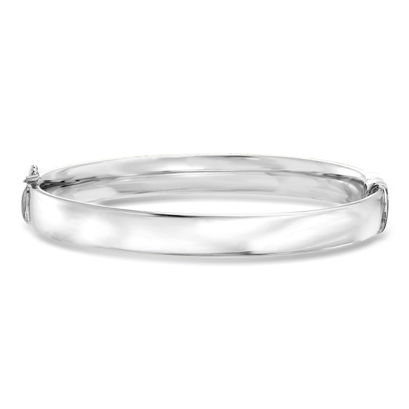 Sterling silver bangle bracelet, smooth oval cuff with clasp detail on ends