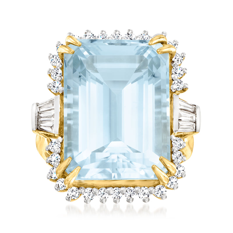 14kt yellow gold ring with large sky-blue topaz center and diamond halo