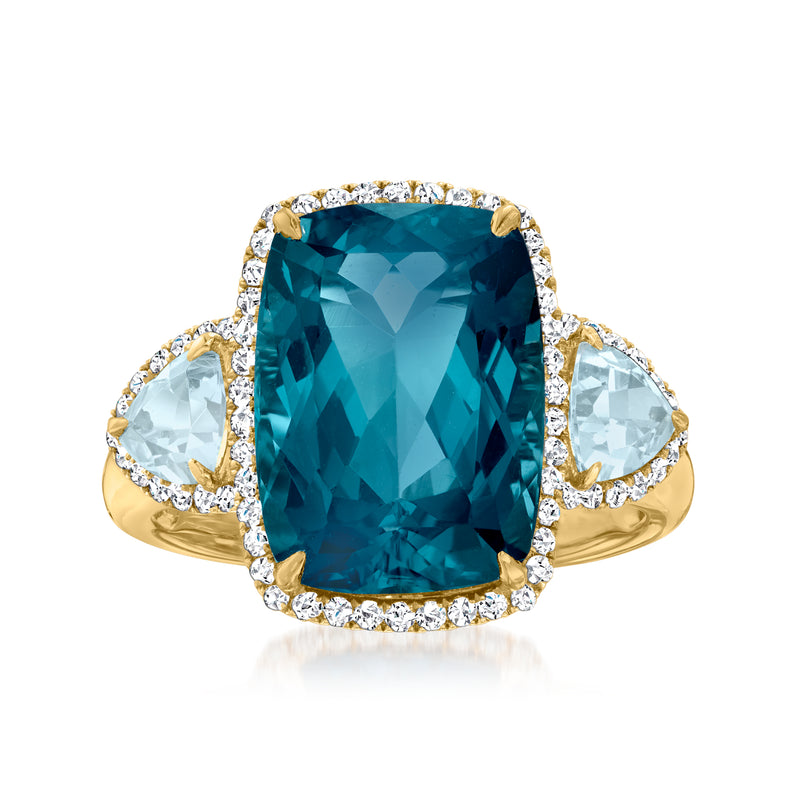 14kt yellow gold ring with cushion-cut blue topaz center and diamond halo