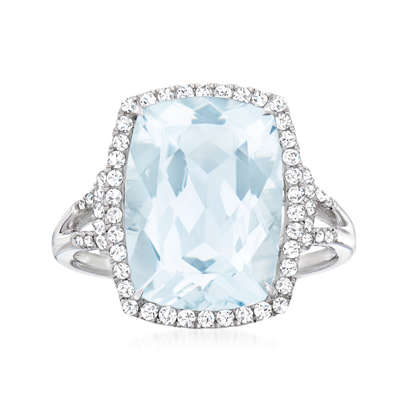 Aquamarine cushion-cut ring with diamond halo and side accents, 14kt white gold
