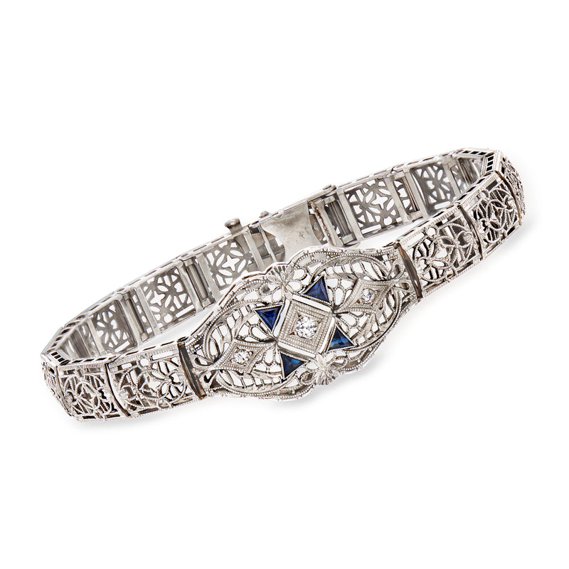 Vintage white gold filigree diamond bracelet with blue synthetic sapphire accents