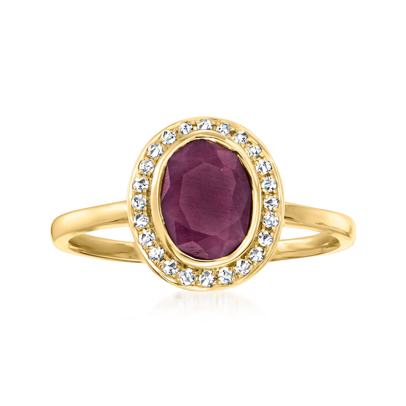 14k yellow gold ring with oval ruby center and round diamond halo