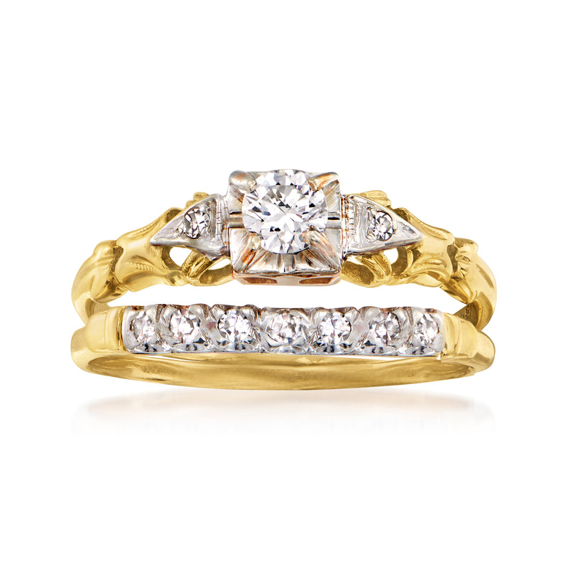 Vintage diamond bridal ring set with round center stone and gold band with side diamonds