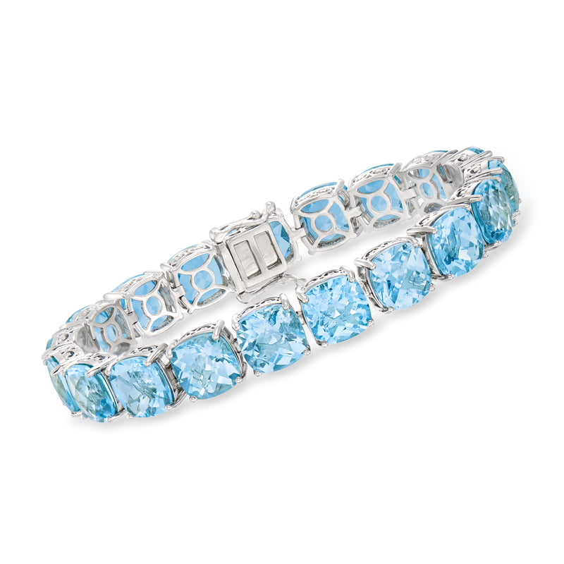 Sterling silver tennis bracelet with sky blue topaz oval stones and openwork links