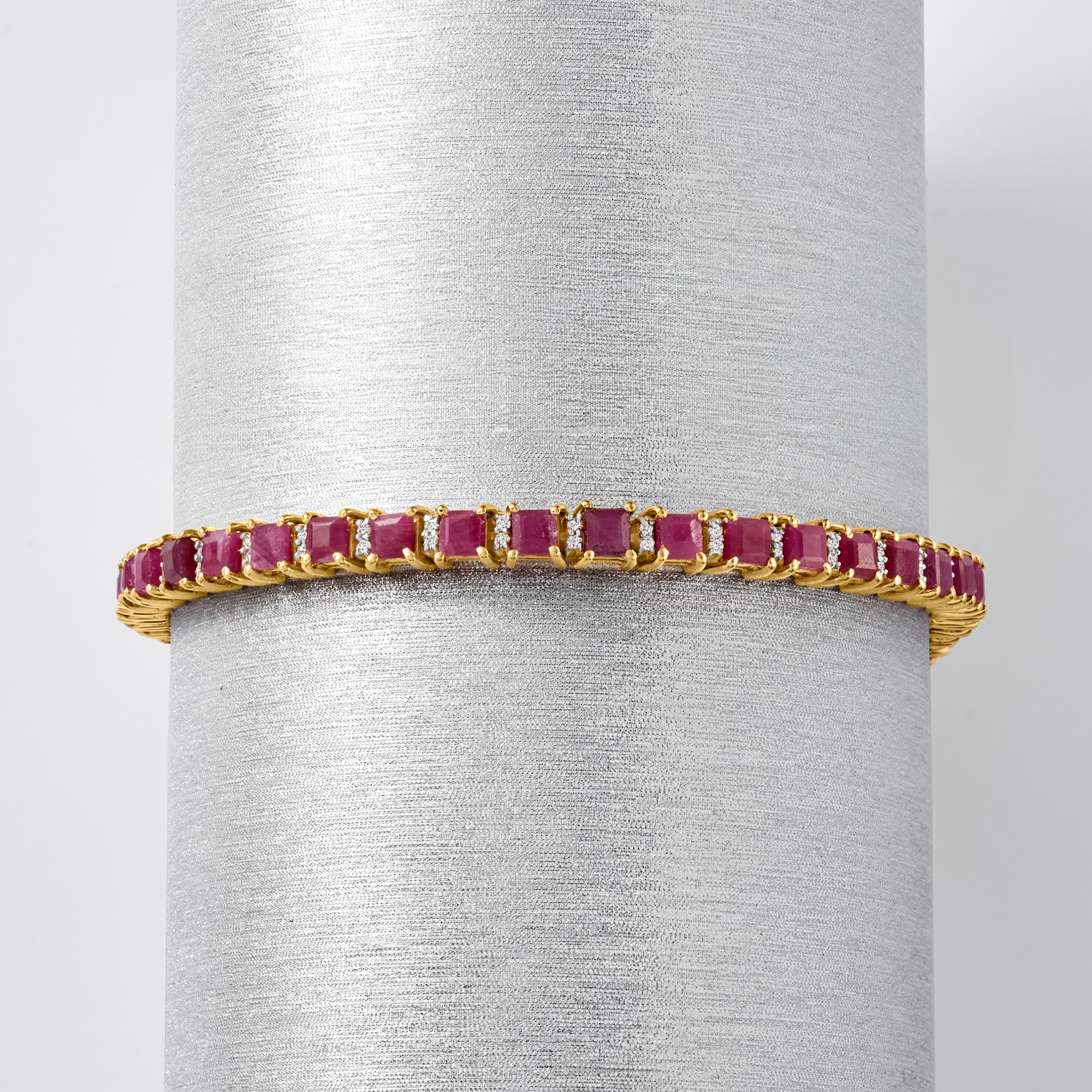 9.50 ct. t.w. Ruby Tennis Bracelet with .50 ct. t.w. Diamonds in 18kt