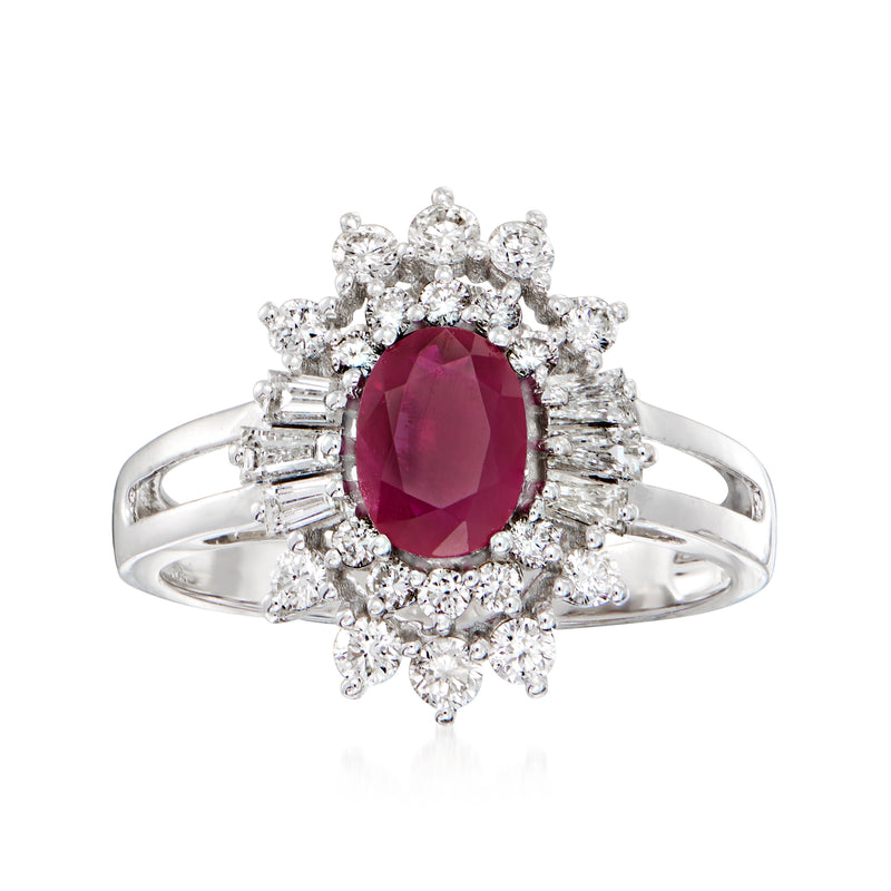 Oval ruby and diamond halo ring in 14k white gold, with side diamond accents