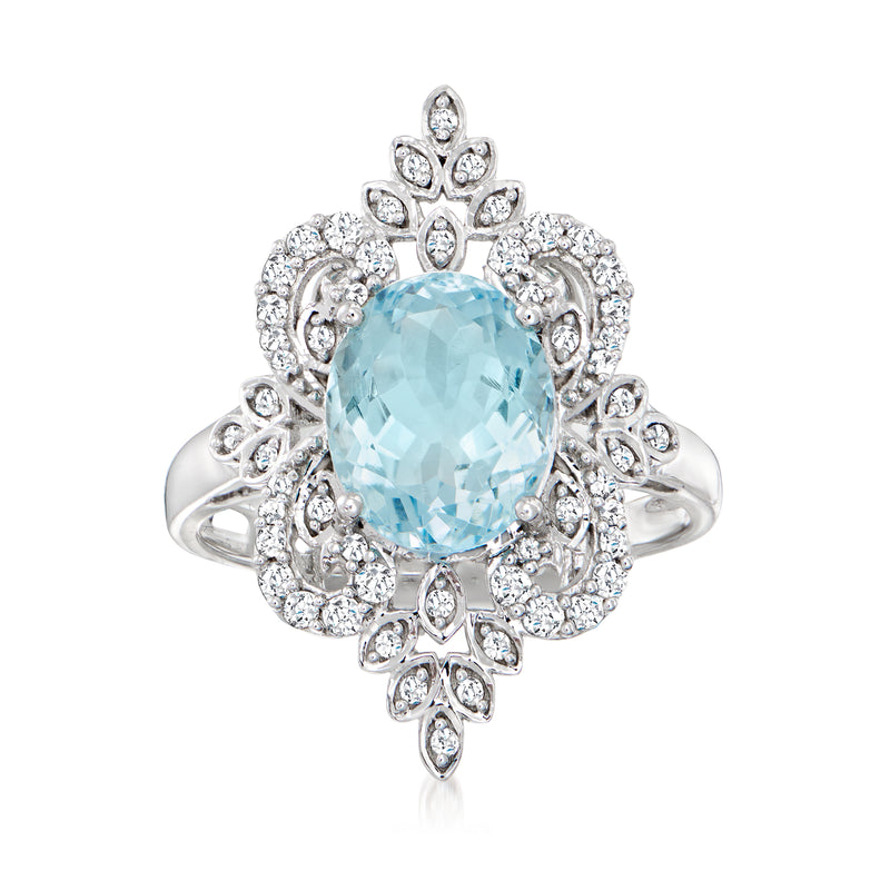 14kt white gold ring with oval aquamarine center and diamond halo, side openwork