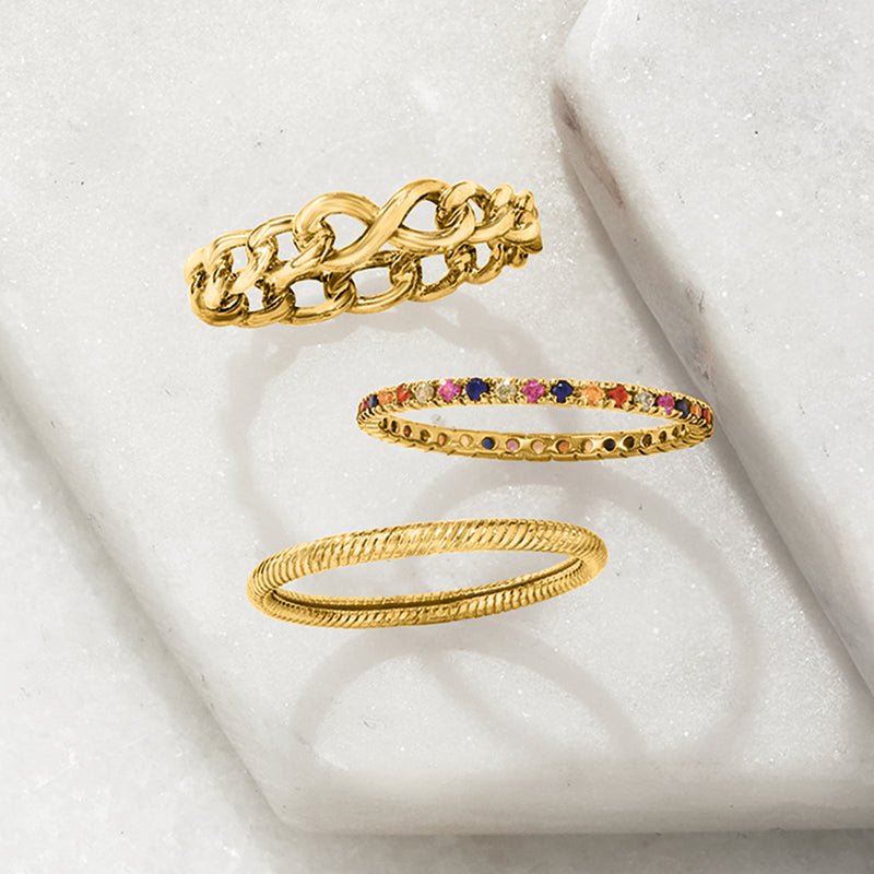 14kt yellow gold roped ring on display, twisted rope texture on slim band