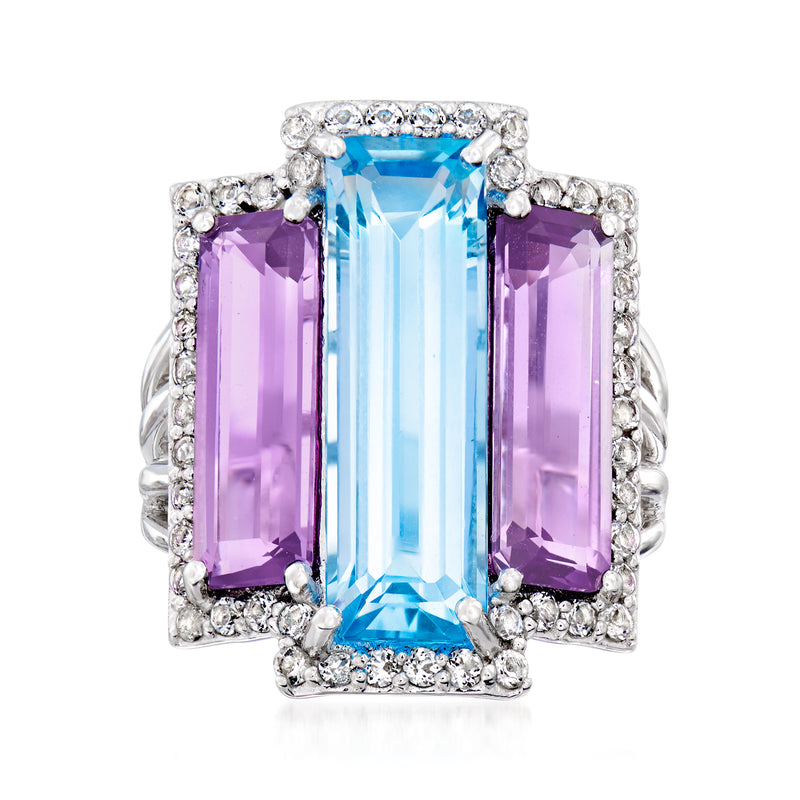 Sterling silver ring with rectangular sky blue topaz center, flanked by amethyst panels