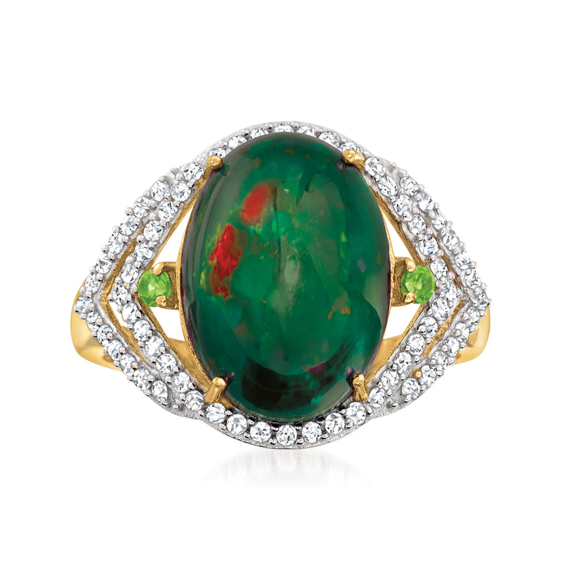 Gold-tone oval green opal-style ring with clear halo stones and side accents