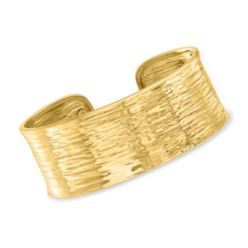 Gold over sterling textured and polished cuff bracelet, open curved design