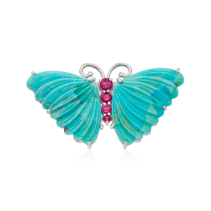 Sterling silver butterfly ring with turquoise wings and three pink rhodolite gemstones.