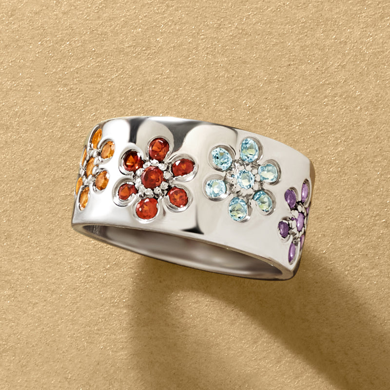 Sterling silver flower ring with blue, red/orange, yellow, and purple clusters