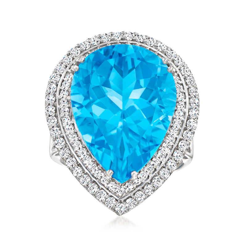 Teardrop blue topaz ring with diamond halo in white gold