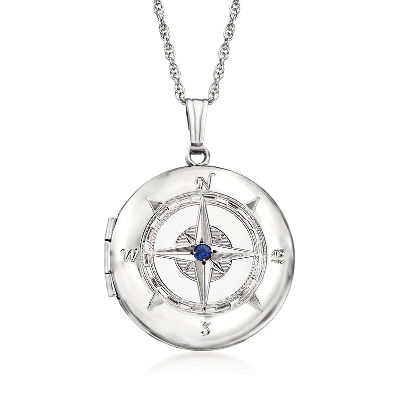 Sterling silver compass locket necklace with round face and blue sapphire detail
