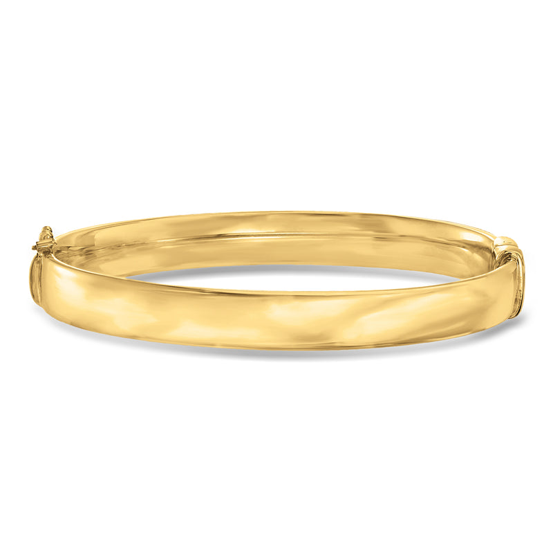Gold-over-sterling bangle bracelet with smooth polished gold-tone band and hinge ends