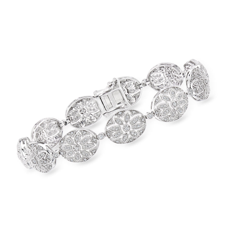 Sterling silver floral diamond bracelet with oval linked flower medallions