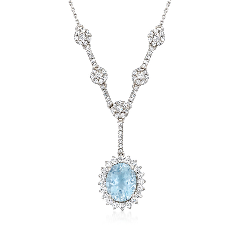 Aquamarine and diamond Y-style necklace in 14kt white gold with blue oval halo