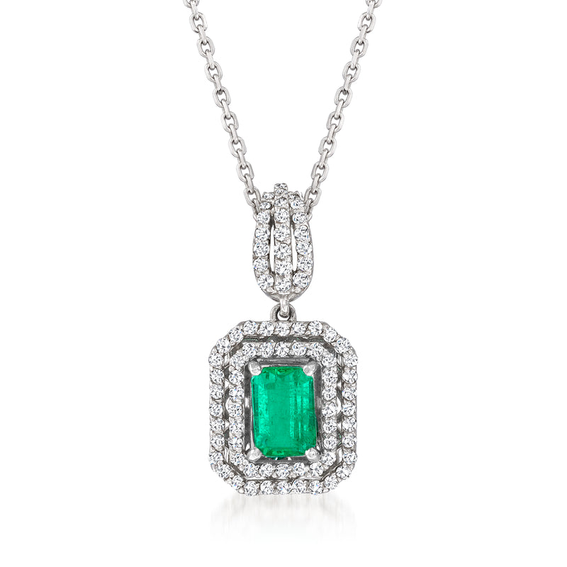 14kt white gold pendant necklace with emerald-cut emerald and diamond halo