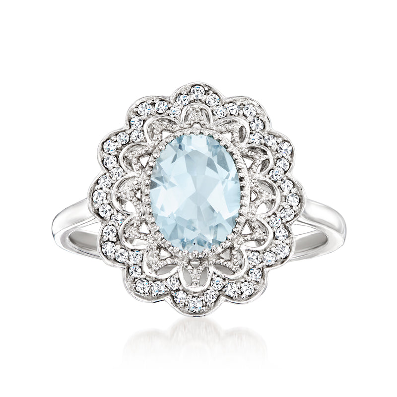 14kt white gold aquamarine and diamond halo ring with oval center stone