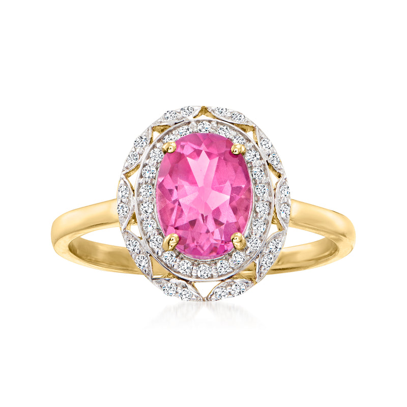 14kt yellow gold ring with oval pink topaz center and diamond halo and accents