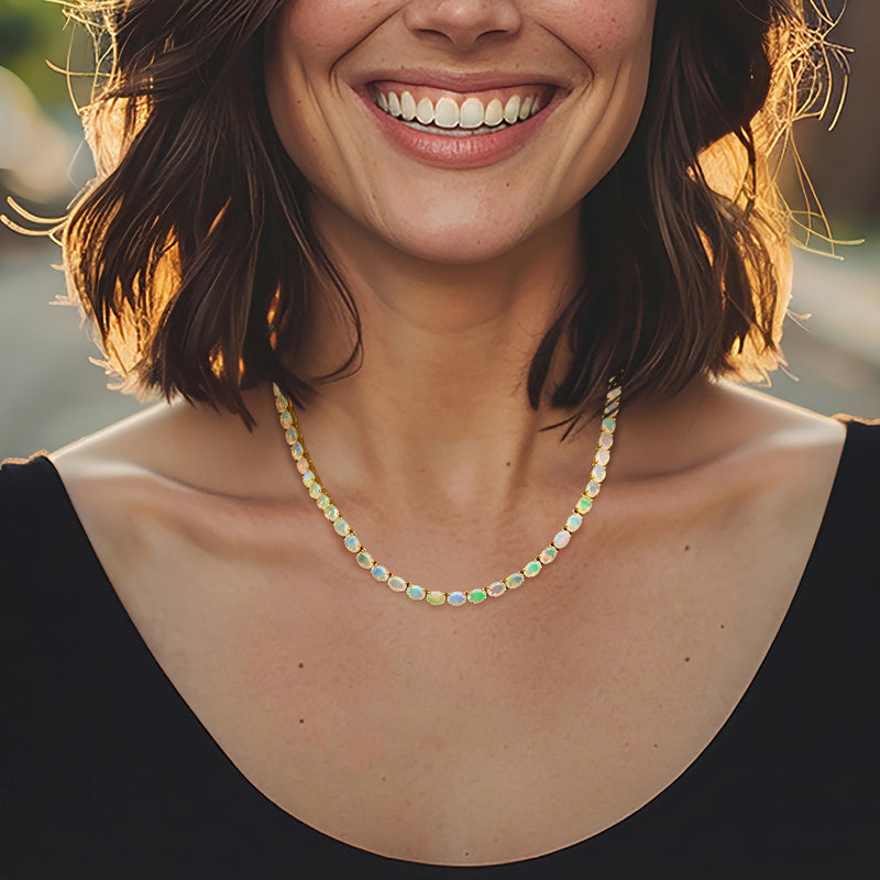 Opal tennis necklace with round opal bead strands in 18kt gold over sterling on model