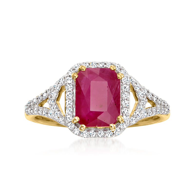 Ruby gemstone ring in 14kt yellow gold with emerald-cut center and diamond halo