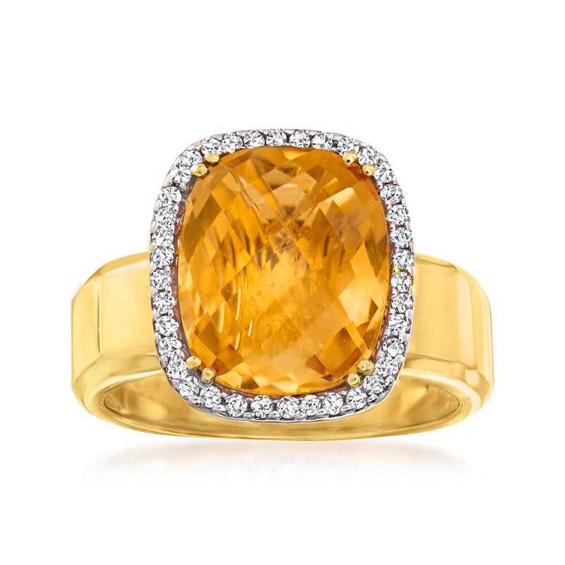 Oval citrine center with diamond halo ring in 14kt yellow gold