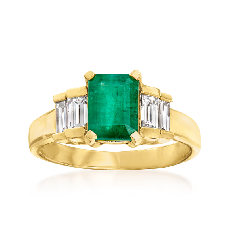 14kt yellow gold ring with emerald-cut green center stone and baguette diamonds