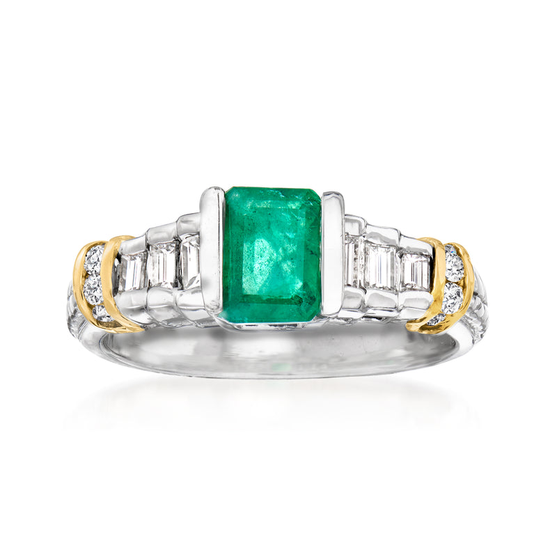 Two-tone gold ring with emerald-cut green gemstone center and baguette diamond sides