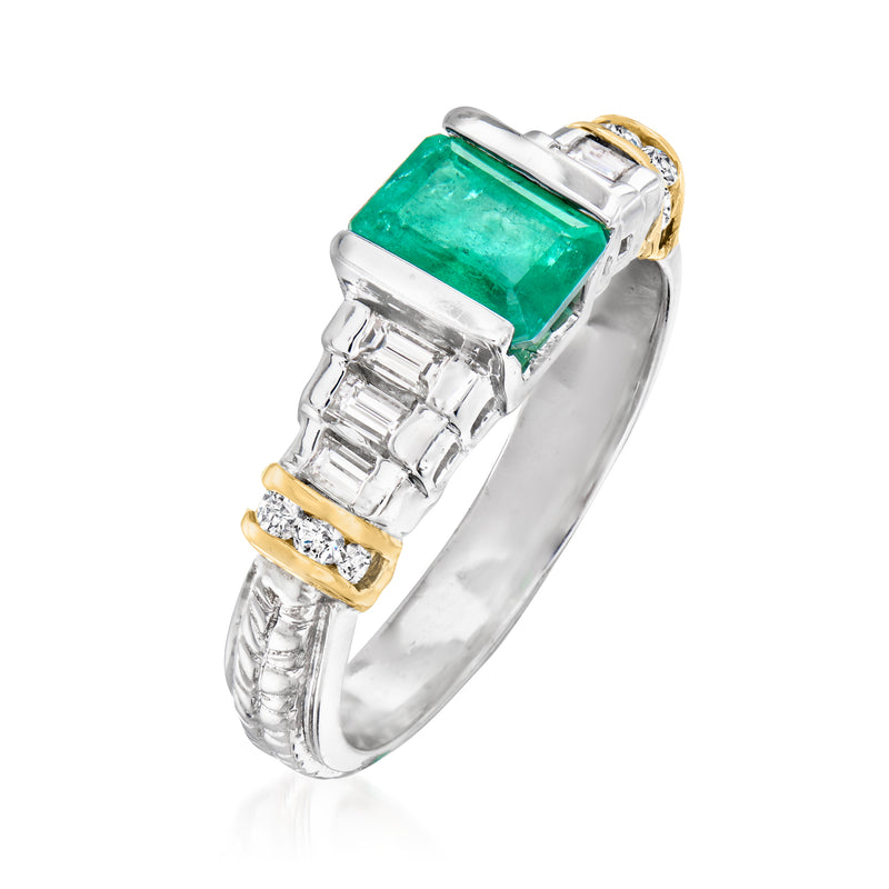 Two-tone gold ring with square emerald gemstone and bezel-set baguette diamonds, side view