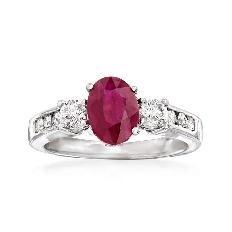 14kt white gold ring with oval ruby center and round diamond side stones