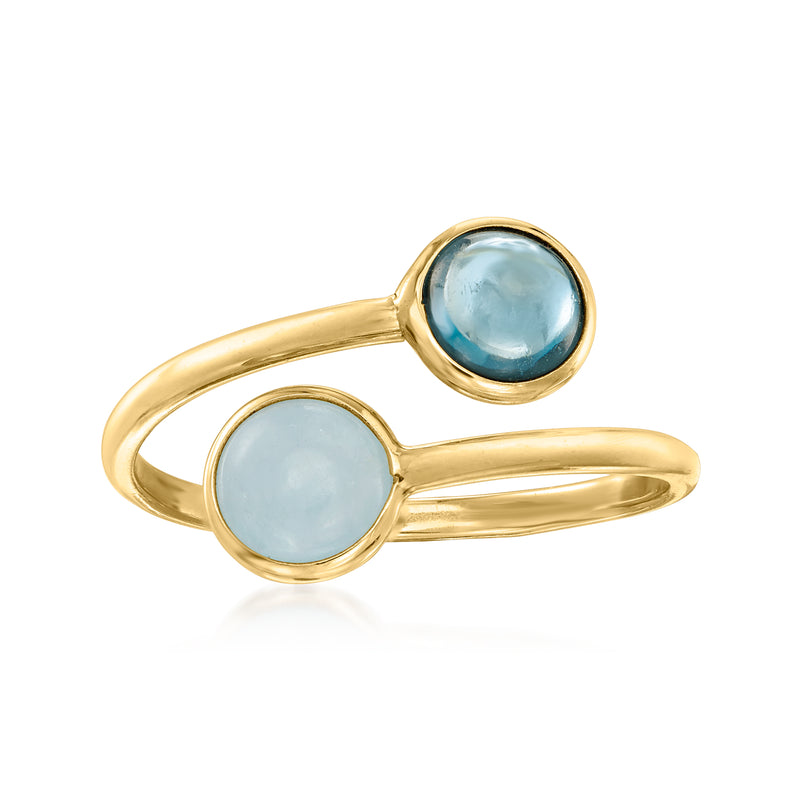 14kt yellow gold bypass ring with two oval light blue gemstones