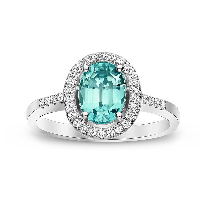 14k white gold ring with oval blue zircon center and diamond halo