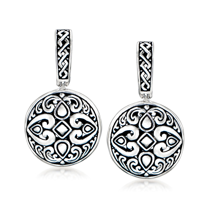 Sterling silver Bali-style drop earrings with round ornate filigree medallion