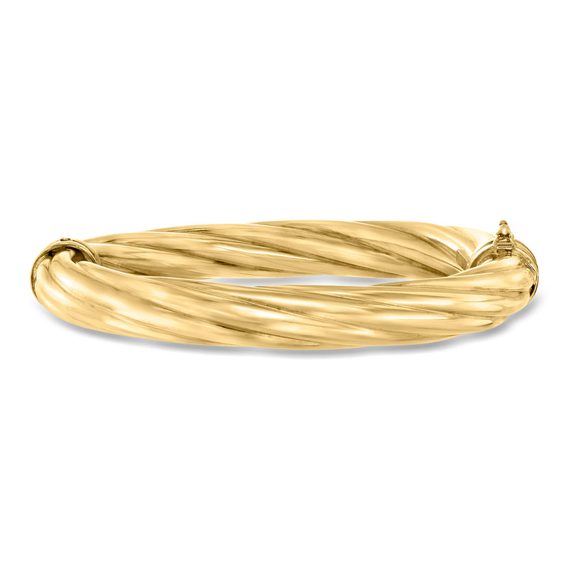 Twisted gold-tone bangle bracelet with rope-like ridges and small end caps
