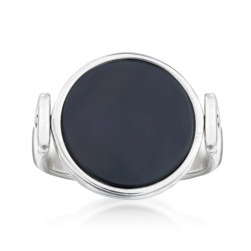 Sterling silver ring with large black onyx-style round face, smooth bezel setting