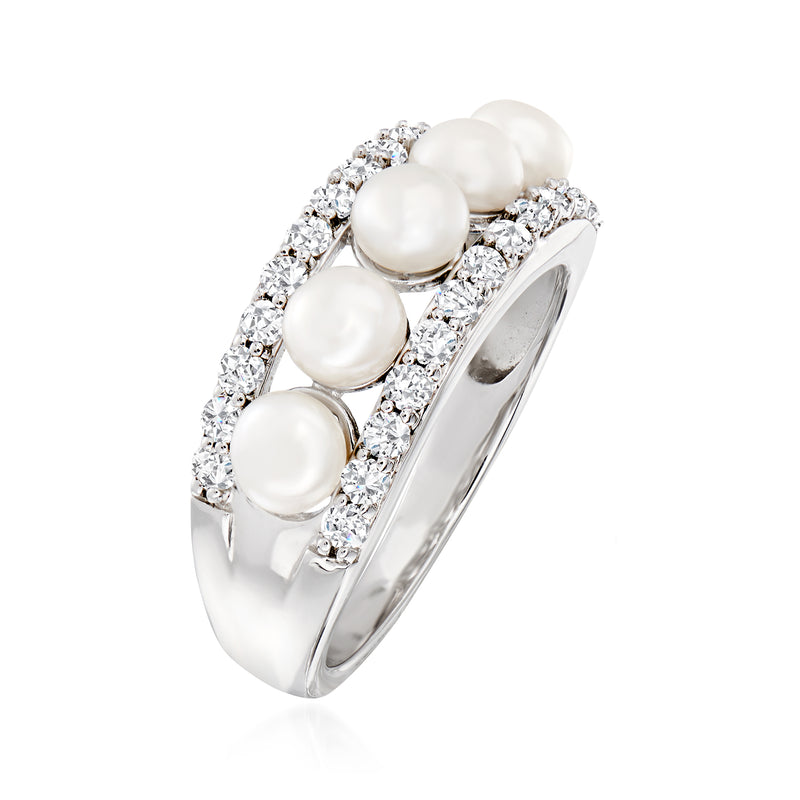 Sterling silver ring with cultured pearls and white gemstone halo-style band